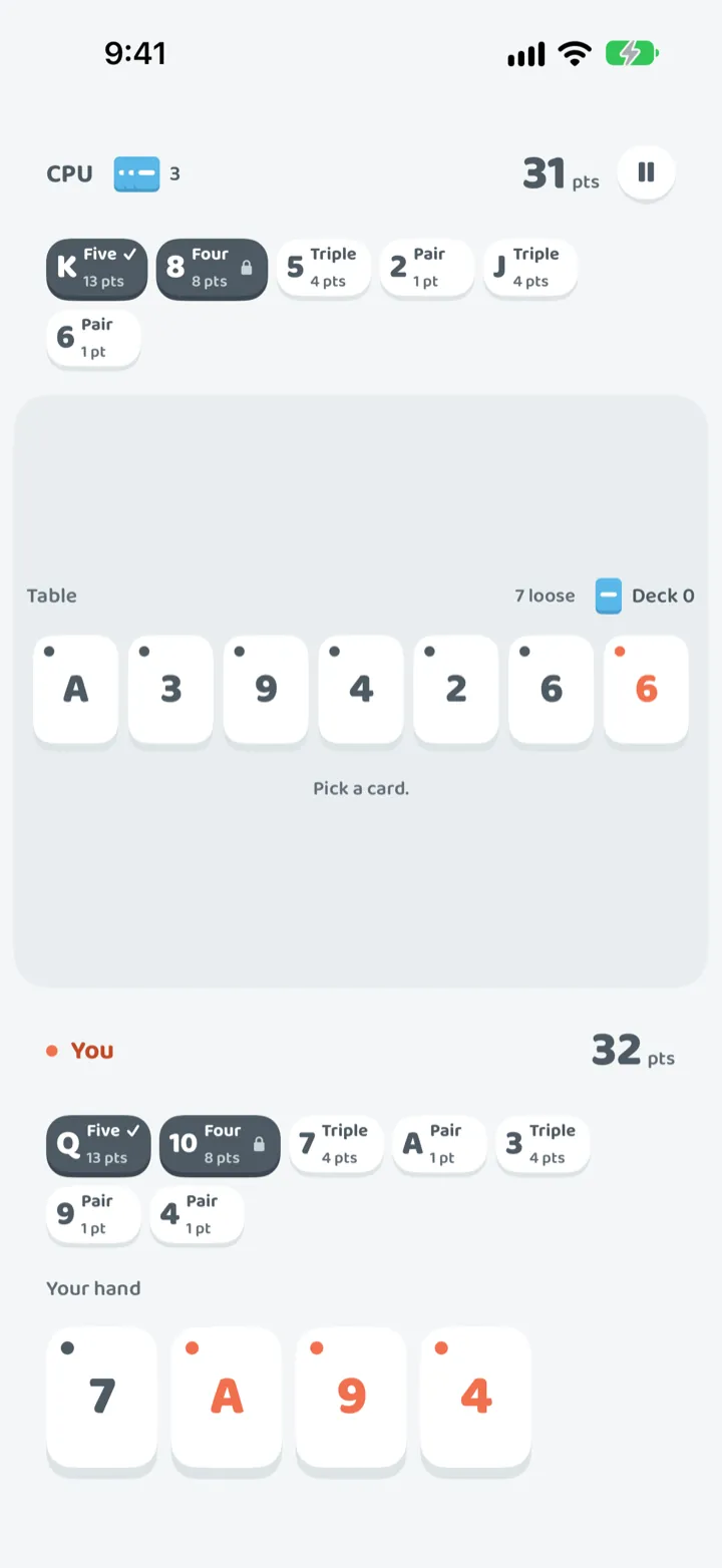 A game against the computer on iPhone: its sets at the top, the shared table in the middle, and your sets and hand below